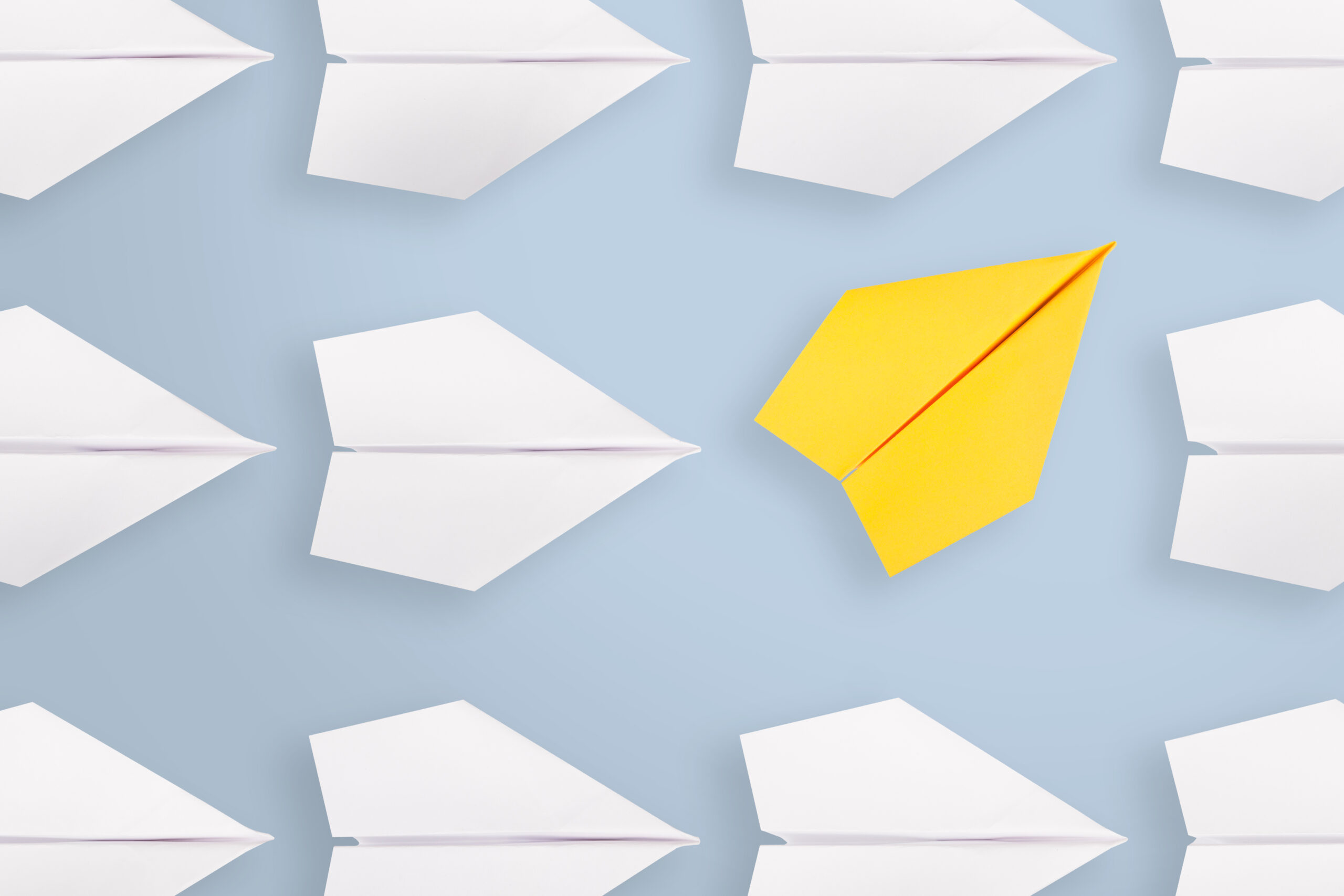 Change concepts with yellow paper airplane Change concepts with yellow paper airplane