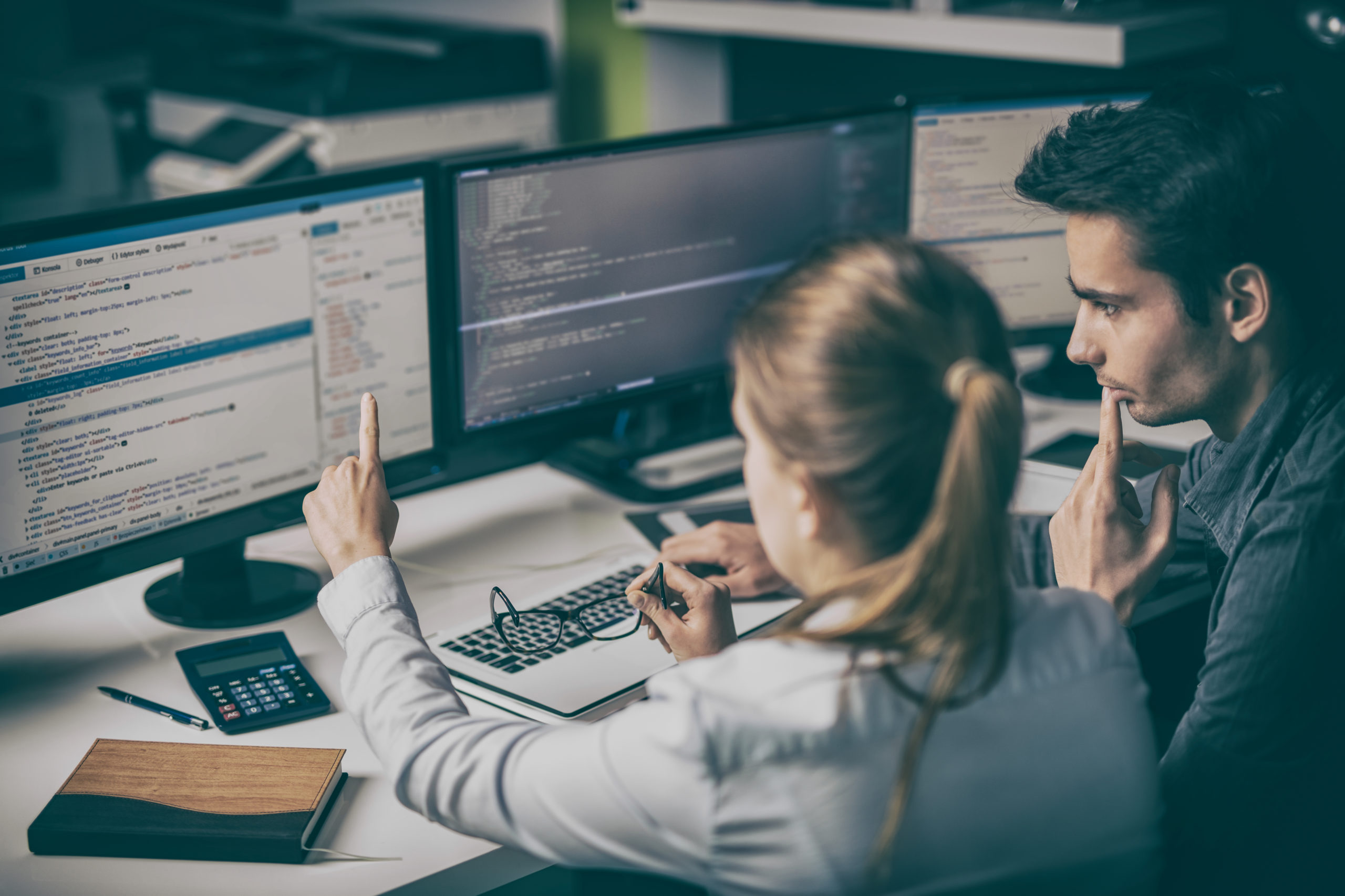 employees looking at computer