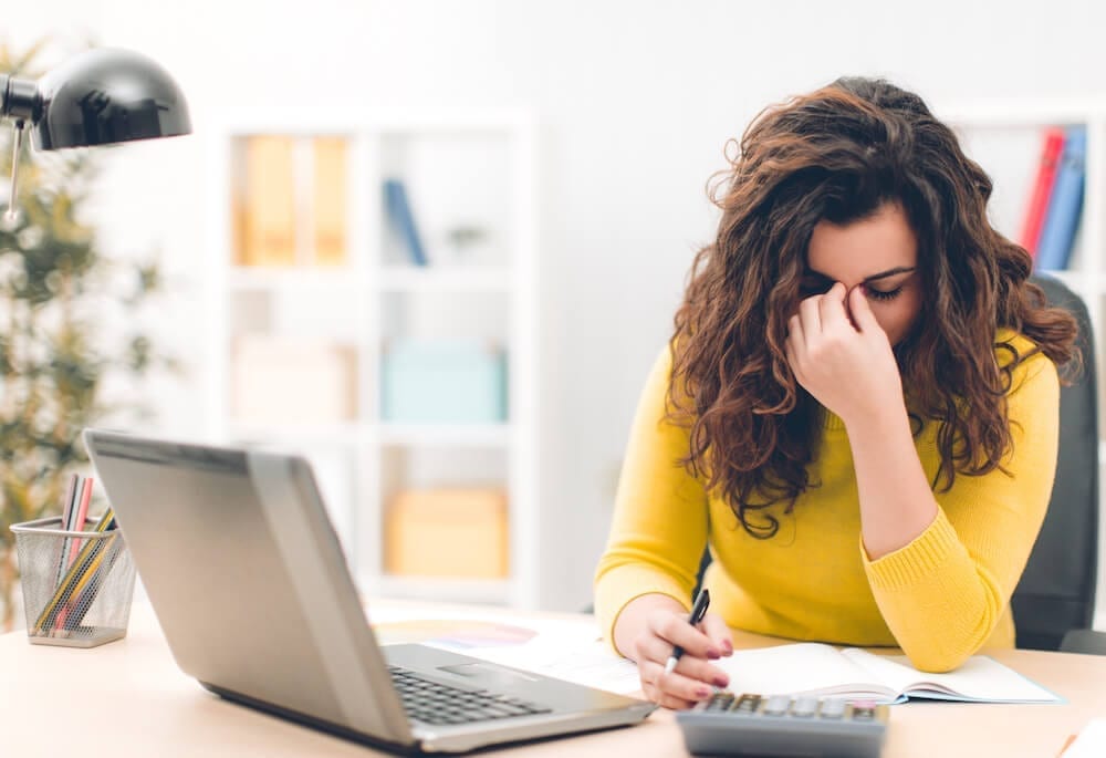 Photo of woman working stressed