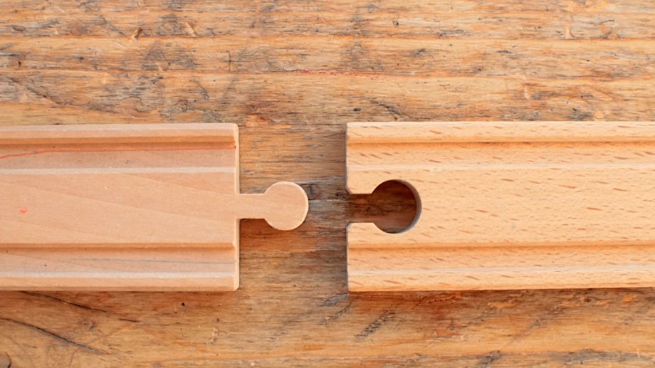 Wooden toy train track closing the gap